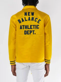 NEW BALANCE Giacche<GIACCA GREATEST HITS COACHS Giallo