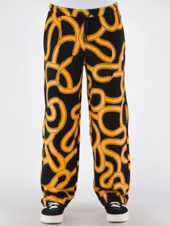 MARCELO BURLON Pantaloni<PANTALONE ALL OVER SNAKES TRACK Giallo, Nero