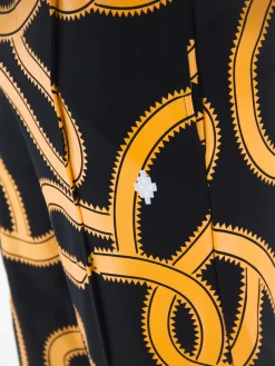 MARCELO BURLON Pantaloni<PANTALONE ALL OVER SNAKES TRACK Giallo, Nero
