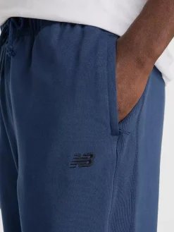 NEW BALANCE Pantaloni<PANTALONE JOGGER ATHLETICS FRENCH TERRY Blu, Nero